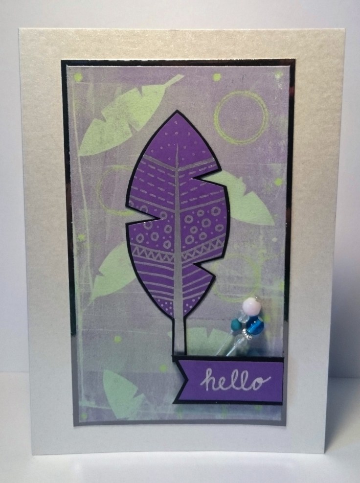 Feather and bead embellishments handmade card.jpg