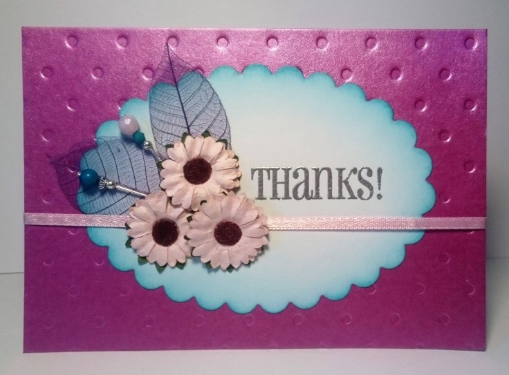 Flowers with skeleton leaves and beaded embellishments handmade card