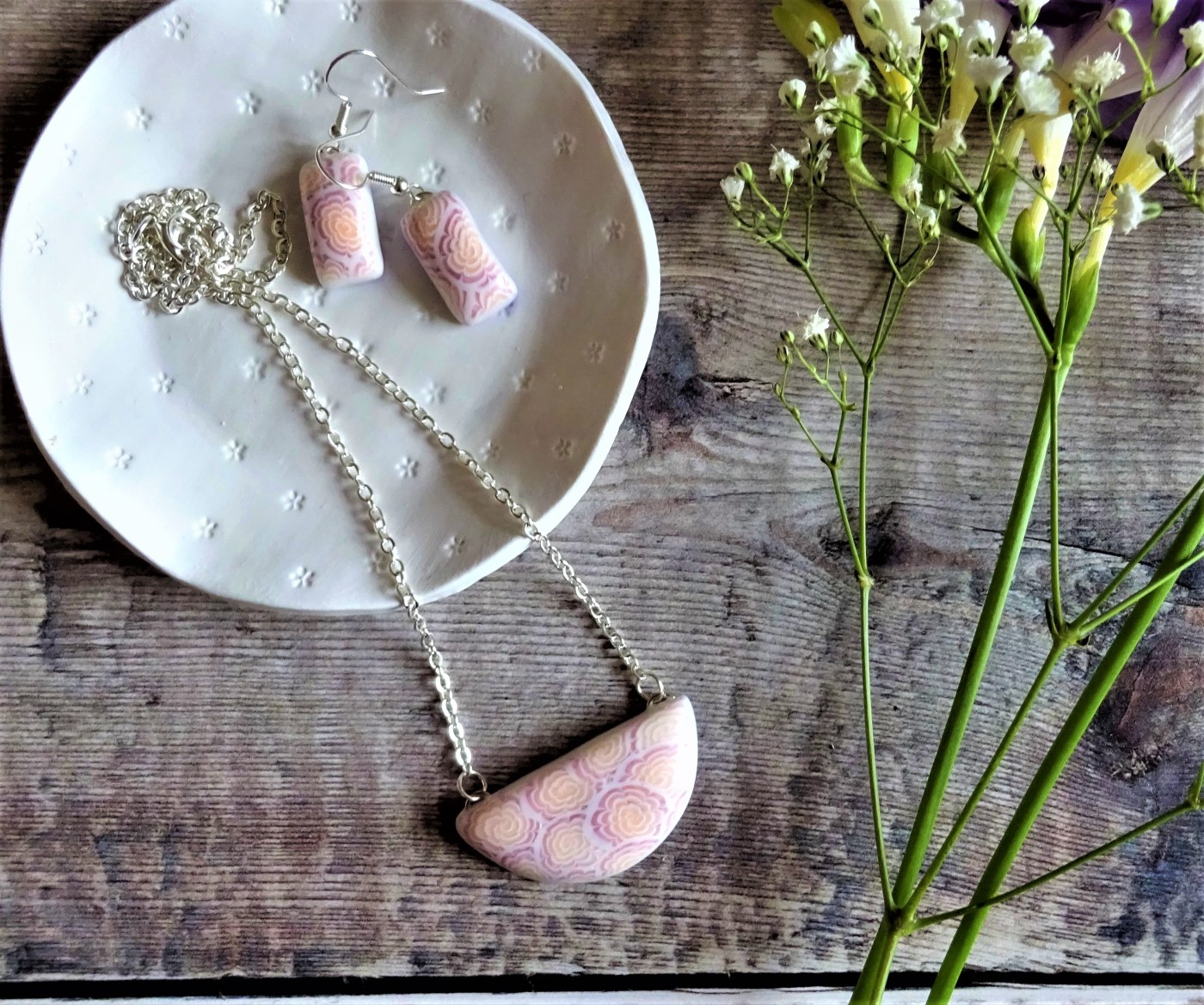 Polymer clay flower jewellery made from translucent clay