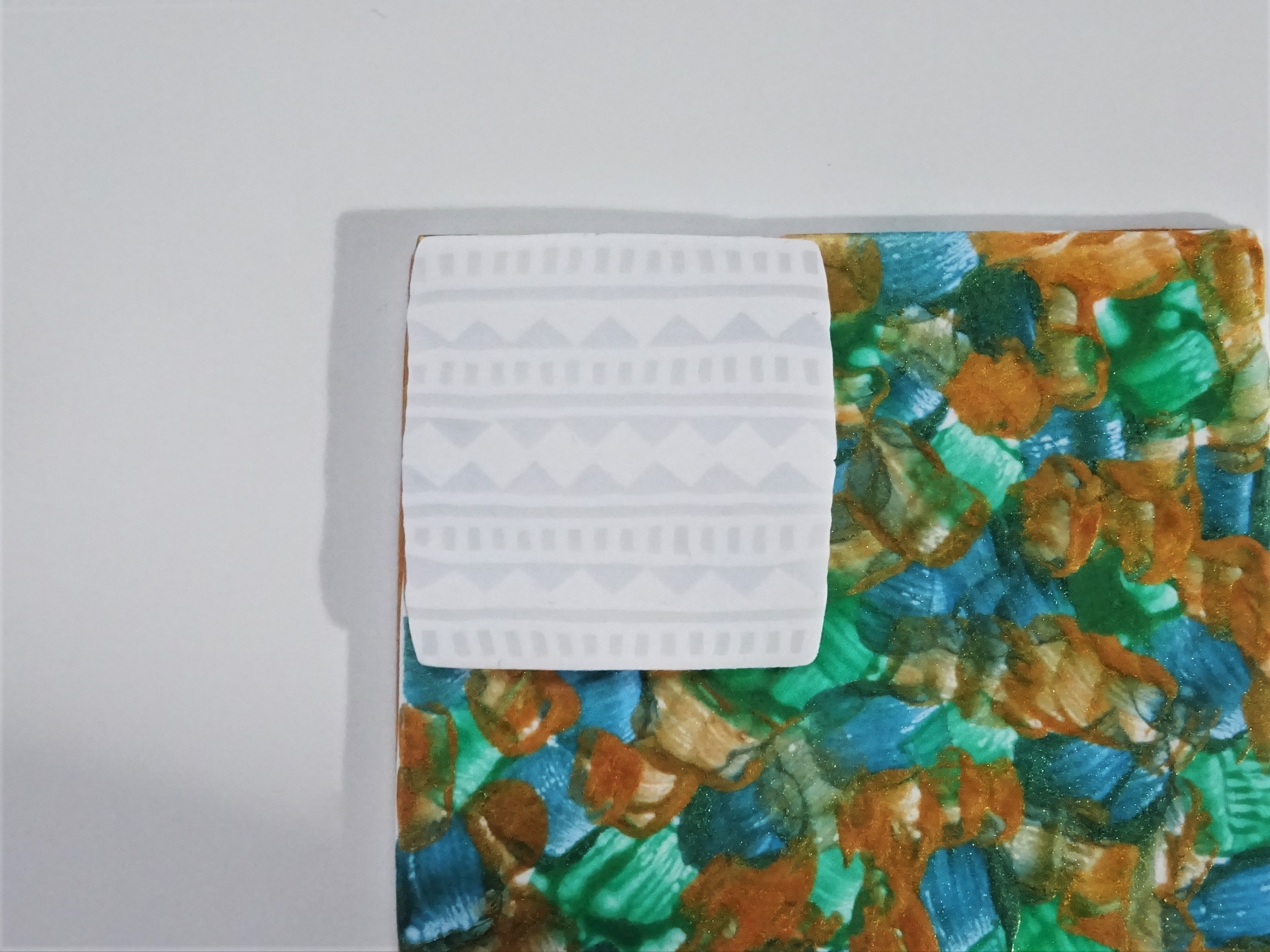 Polymer clay translucent and white aztec cane with watercolour technique