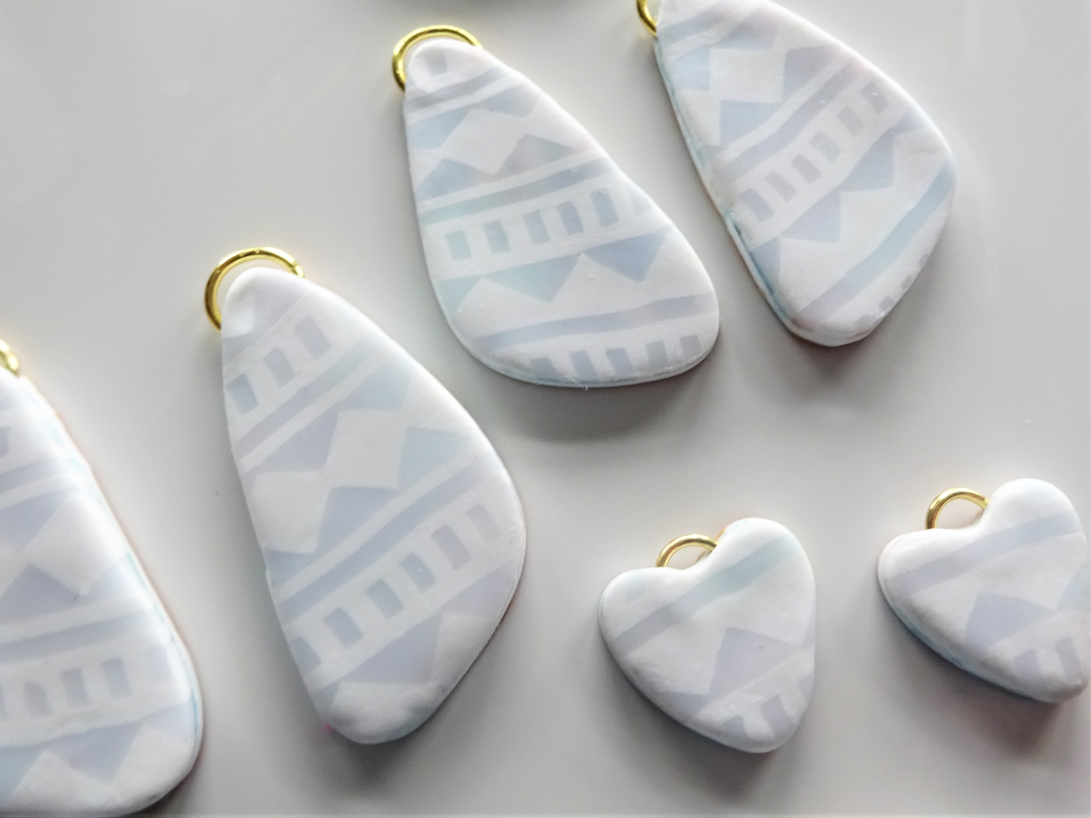 Polymer clay translucent and white aztec cane with watercolour technique