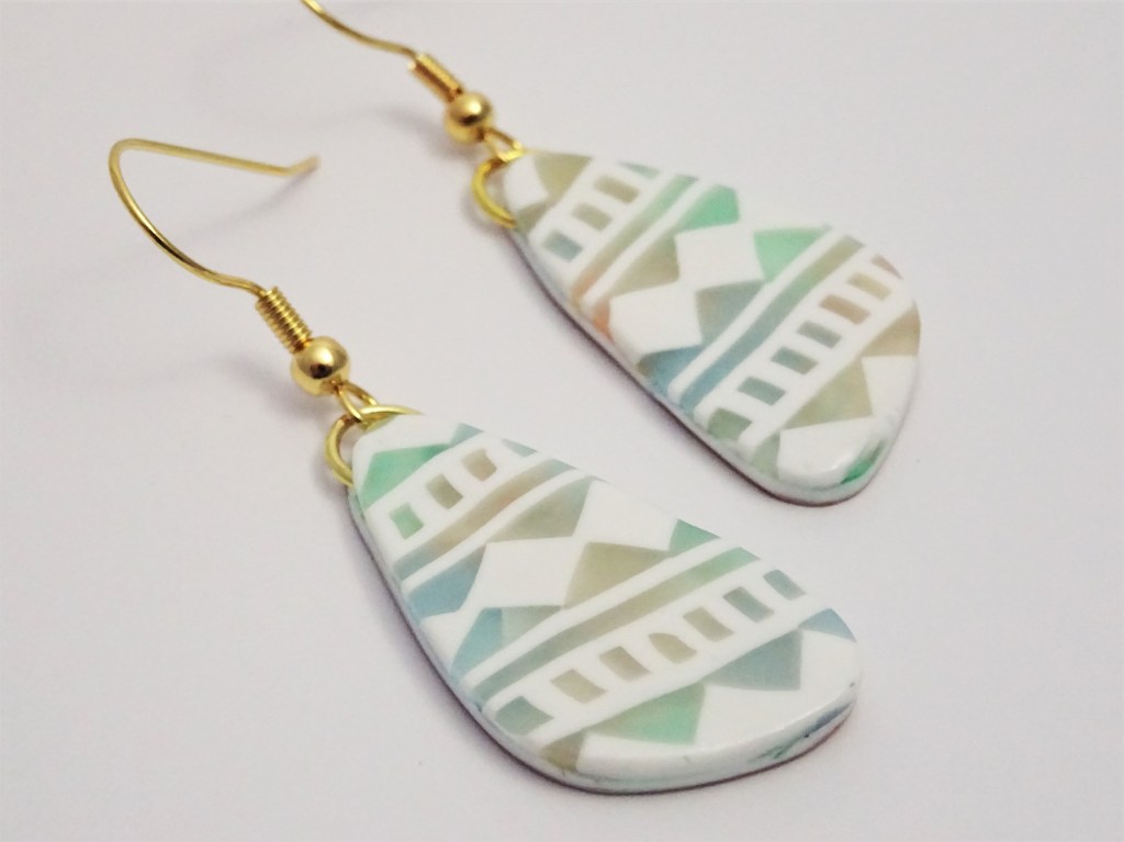 Polymer clay translucen and white aztec cane with watercolour technique