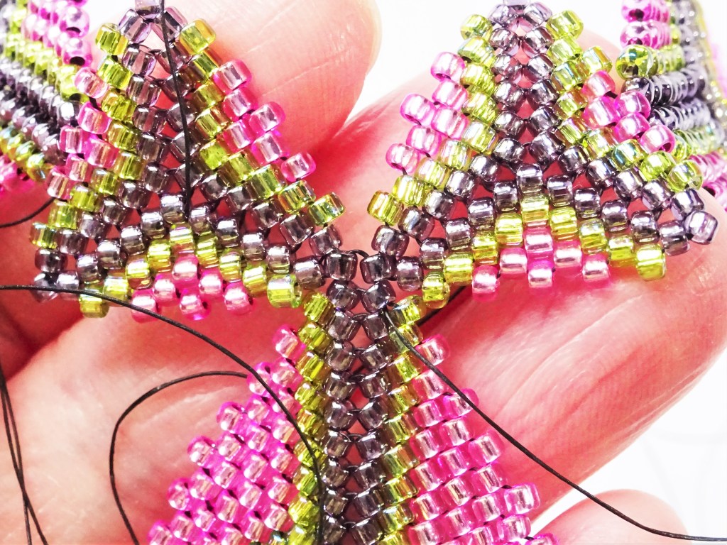 Peyote-stitch-triangle-with-twisted-rope-necklace