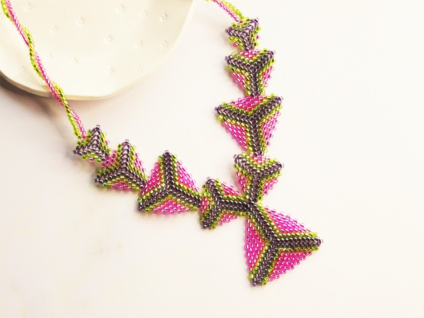 Peyote triangle necklace with twisted rope