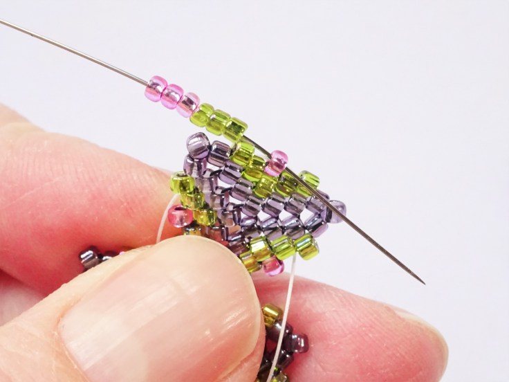 Peyote-stitch-triangle-with-twisted-rope-necklace