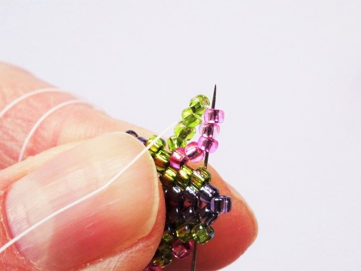 Peyote-stitch-triangle-with-twisted-rope-necklace