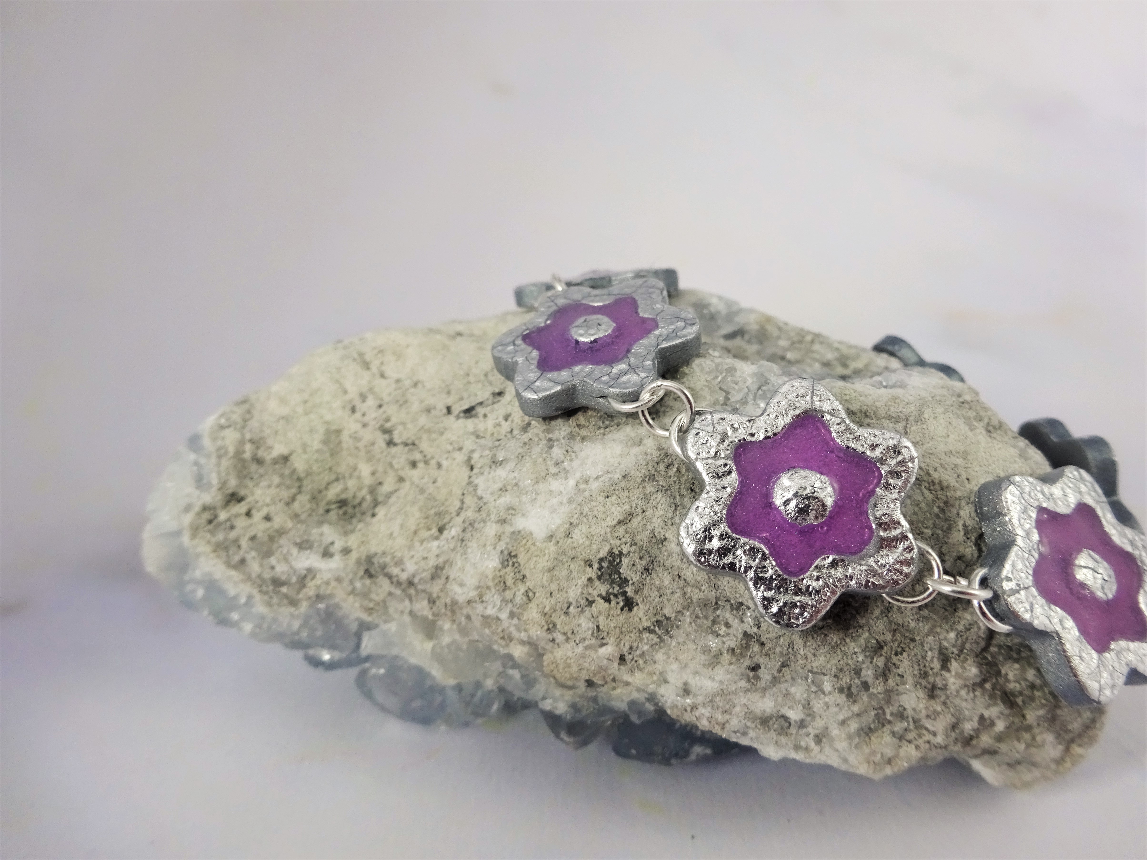 Imitation hammered silver polymer clay bracelet with pink inlay