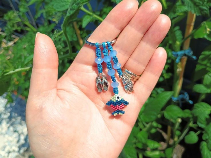 Handbag charm made using a peyote beaded fish and macramé