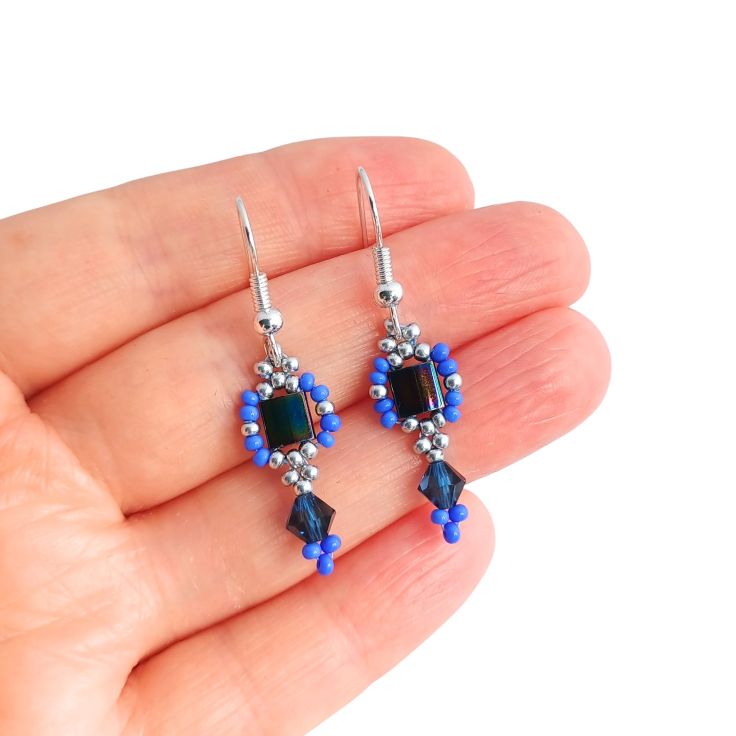 Blue seed bead and tila bead earrings with bicone drop