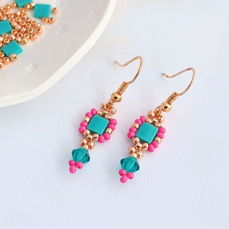 How to make Tila bead and seed bead earrings with a bicone drop.